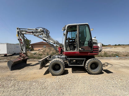 Pelle à pneus Takeuchi TB295W 2019 — occasion