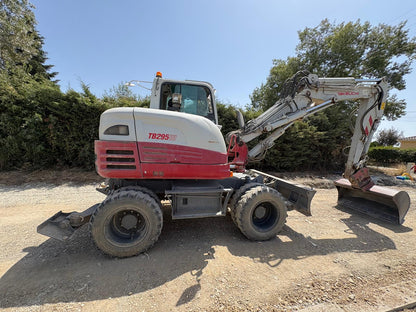 Pelle à pneus Takeuchi TB295W 2019 — occasion